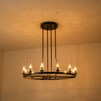 Lustre cylindrique moderne du milieu du siècle à 12 lumières en verre transparent, forme de roue de chariot, or et noir, grand modèle