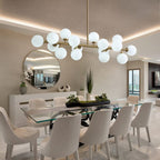 Lustre linéaire moderne du milieu du siècle de 101,6 cm (40 po), suspension Sputnik en laiton doré à 16 lumières avec globe en verre dépoli pour salle à manger