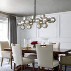 Lustre linéaire moderne du milieu du siècle de 101,6 cm (40 po), suspension Sputnik en laiton doré à 16 lumières avec globe en verre dépoli pour salle à manger