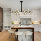 Lustre linéaire moderne du milieu du siècle de 101,6 cm (40 po), suspension Sputnik en laiton doré à 16 lumières avec globe en verre dépoli pour salle à manger