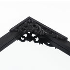 Miroir sur pied arqué en bois massif sculpté